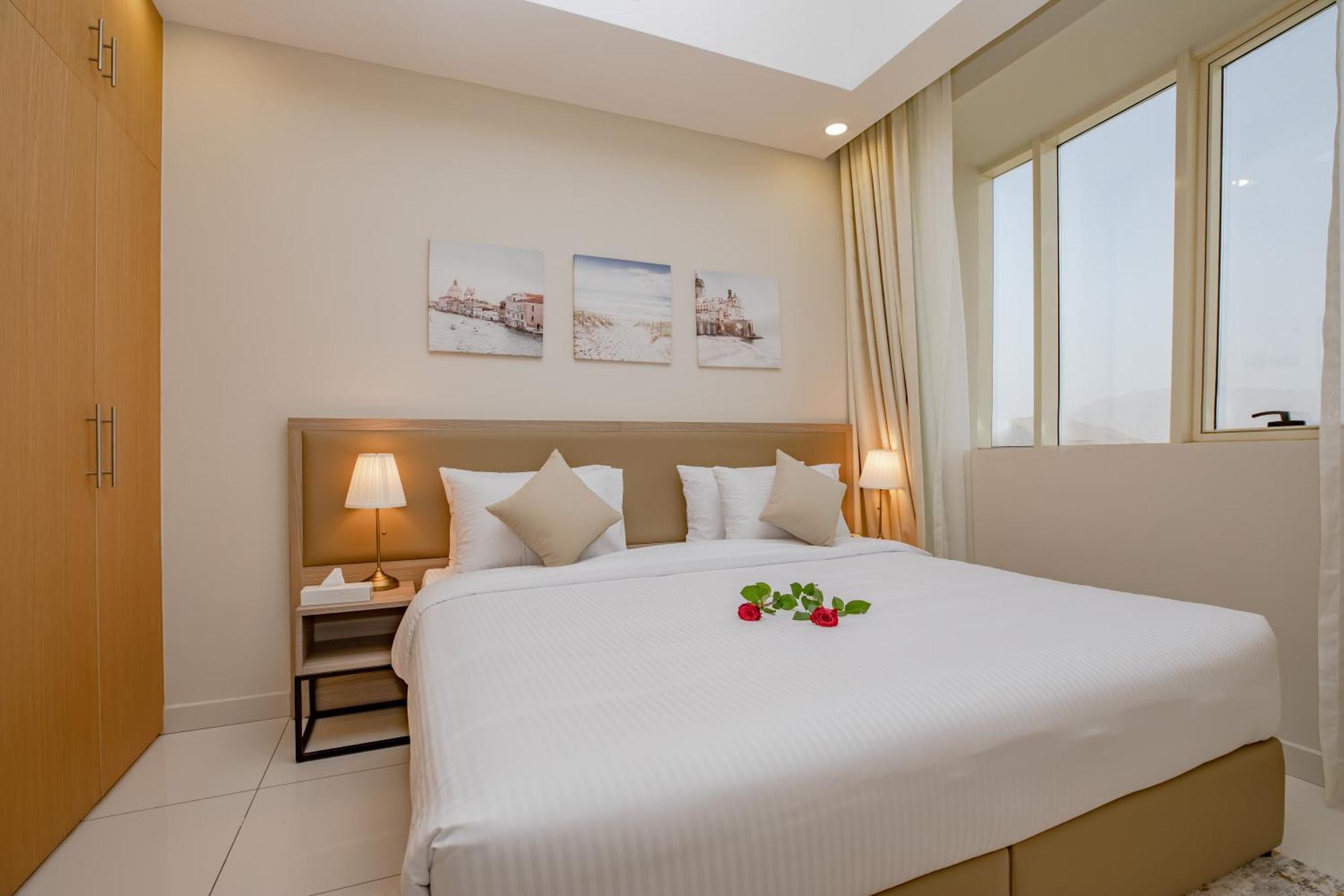 Platinum Coast Hotel Apartments Fudžajra Pokoj fotografie A bedroom in a hotel